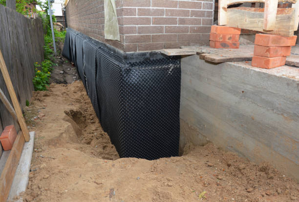 Happy homeowners after waterproofing job in Cramerton